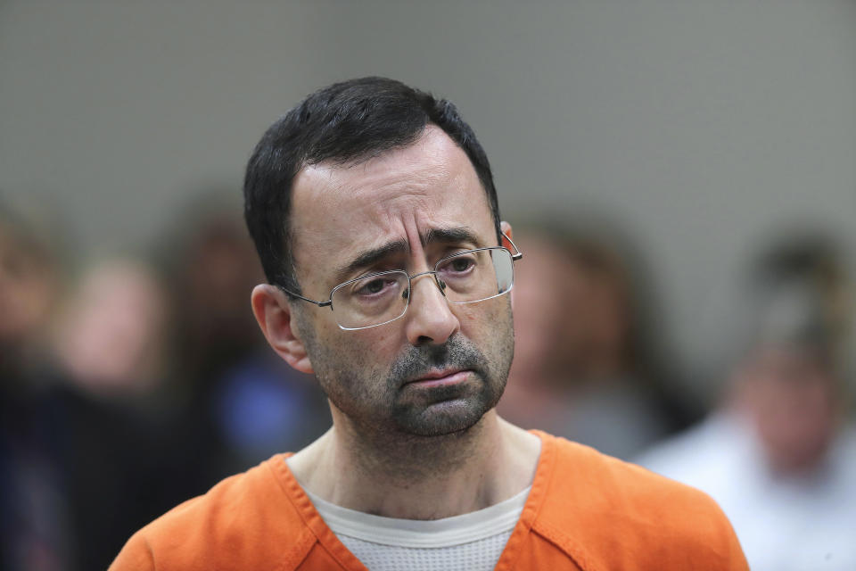Larry Nassar was stabbed twice in the neck, twice in the chest and six times in the back at a federal prison on Sunday. (AP Photo/Paul Sancya, File)