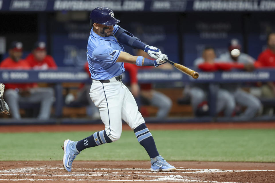 Tampa Bay Rays' Jose Caballero hits a two-run home run against the Washington Nationals during the second inning of a baseball game Sunday, June 30, 2024, in St. Petersburg, Fla. (AP Photo/Mike Carlson)