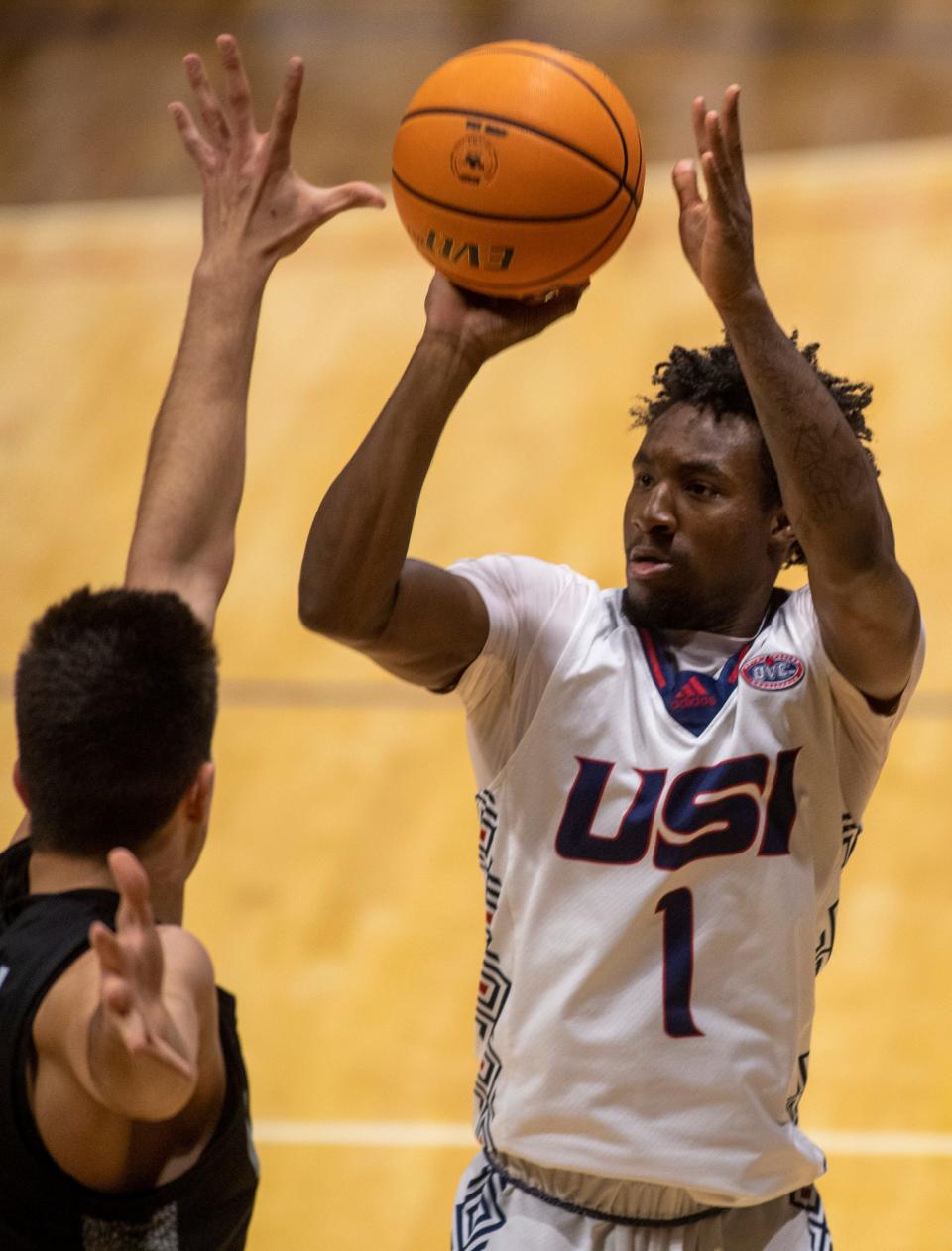 Southern Indiana’s Isaiah Swope (1) takes a three-point shot as the University of Southern Indiana Screaming Eagles play the University of Arkansas Little Rock Trojans at Screaming Eagles Arena in Evansville, Ind., Thursday, Jan. 12, 2023.