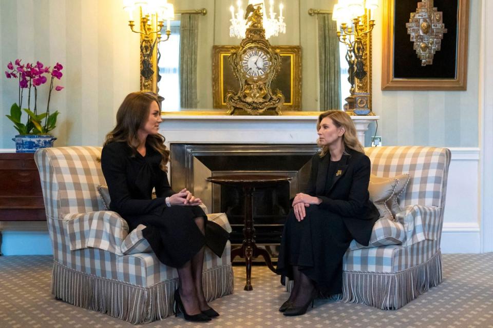 Britain's Catherine, Princess of Wales (L) speaks with First Lady of Ukraine, Olena Zelenska (L) during a meeting at Buckingham Palace on September 18, 2022. - Britain was gearing up Sunday for the momentous state funeral of Queen Elizabeth II as King Charles III prepared to host world leaders and as mourners queued for the final 24 hours left to view her coffin, lying in state in Westminster Hall at the Palace of Westminster. (Photo by Kirsty O'Connor / POOL / AFP) (Photo by KIRSTY O'CONNOR/POOL/AFP via Getty Images)