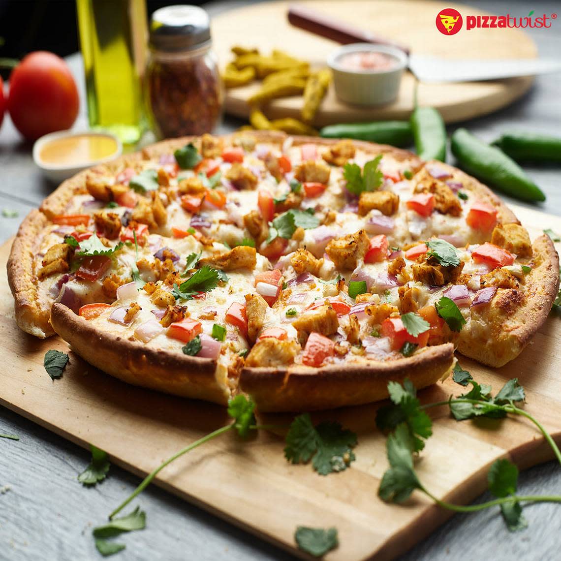 Pizza Twist says “you can’t go wrong” with its Butter Chicken Pizza.