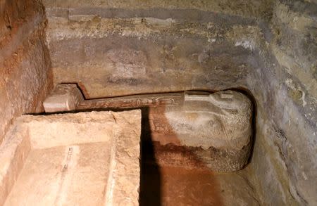 Enclosed coffins seen inside a chamber in a recently discovered burial shaft near Egypt's Saqqara necropolis, in Giza Egypt July 14, 2018. REUTERS/Mohamed Abd El Ghany