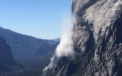 Dust pours from El Capitan, where Andrew Foster was killed - Credit: Jon Kameen/PA