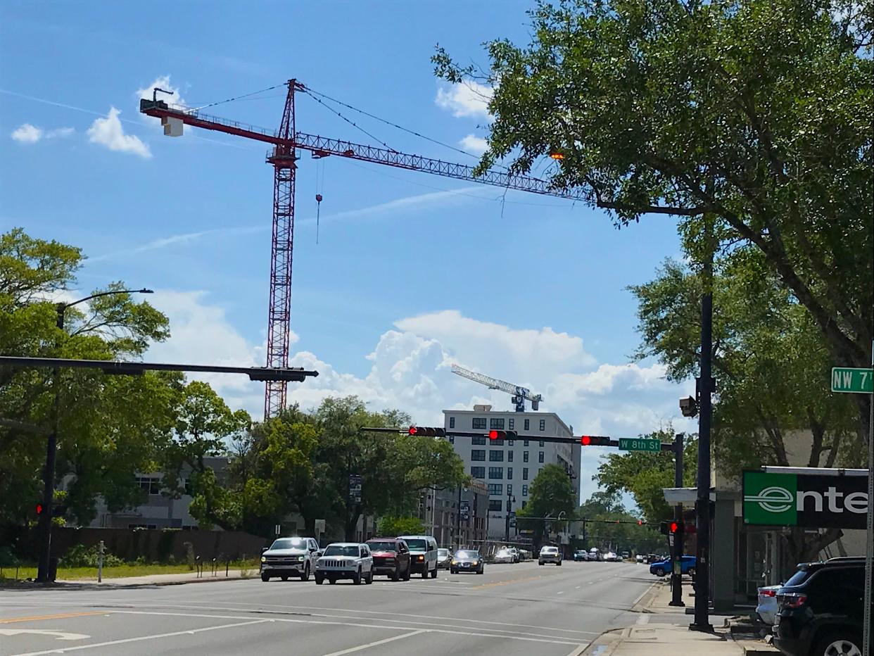 University Avenue, looking west toward 10- and 11-story student apartment buildings under construction.
