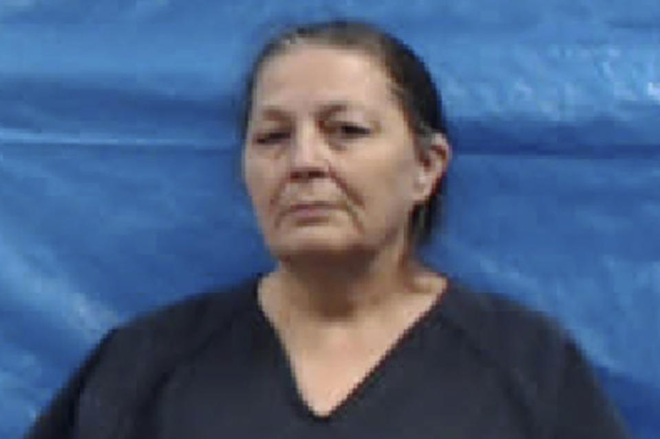 This image provided by the Roane County Jail shows Shirley Ann Gray. Gray and her husband, Michael Anthony Gray, face charges after police found the skeletal remains of a girl buried in their yard. The Roane County, Tenn., couple, arrested on Monday, May 25, 2020, are charged with aggravated child abuse, especially aggravated kidnapping, aggravated child neglect and abuse of a corpse, authorities said. (Roane County Jail via AP)