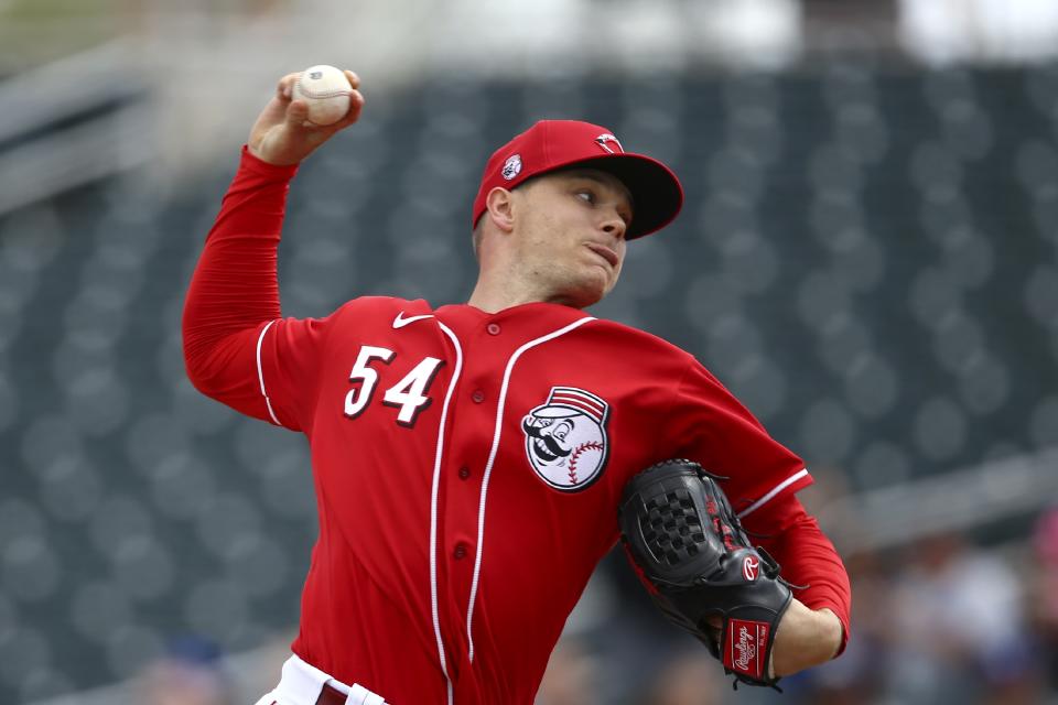 Cincinnati Reds starting pitcher Sonny Gray throws against the Los Angeles Dodgers during the first inning of a spring training baseball game Monday, March 2, 2020, in Goodyear, Ariz. (AP Photo/Ross D. Franklin)