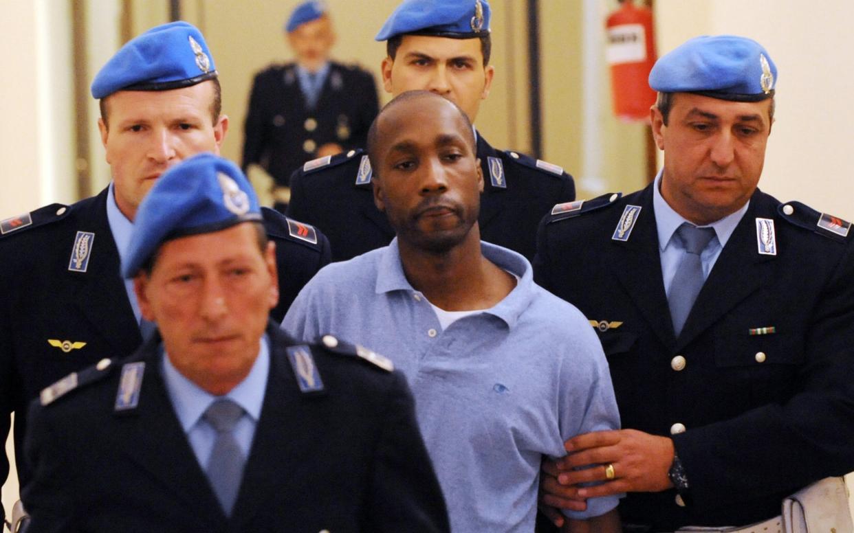 Rudy Guede has been released early to serve the remainder of his sentence via community service - TIZIANA FABI /AFP