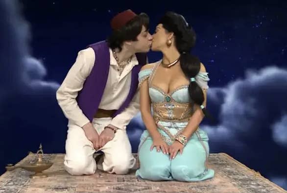 Pete Davidson and Kim Kardashian kissing as Aladdin and Jasmine