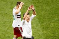 Soccer Football - World Cup - Group F - South Korea vs Mexico - Rostov Arena, Rostov-on-Don, Russia - June 23, 2018 Mexico coach Juan Carlos Osorio and Javier Hernandez celebrate victory after the match REUTERS/Darren Staples