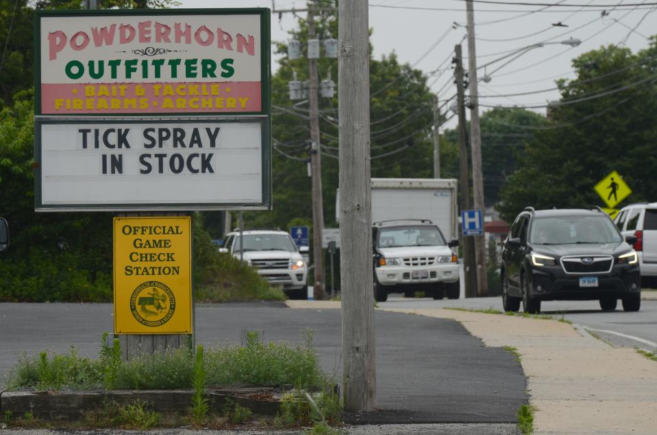 Tick spray availability is the sole focus in early July on a sign at Powderhorn Outfitters along Barnstable Road in Hyannis.