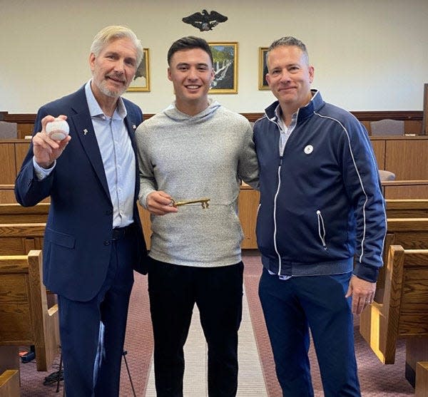 Yankees shortstop Anthony Volpe is given the "Keys to Watchung" by Mayor Ronald Jubin, left, and Councilman Curt Dahl during a visit last week to the town where he grew up.
