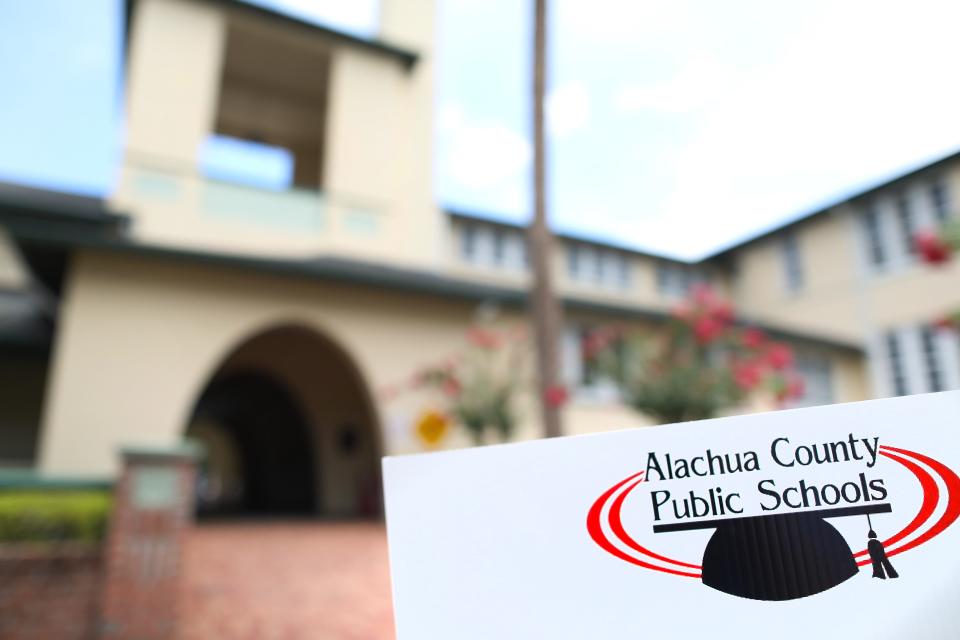 A sign outside the Alachua County School Board office in Gainesville, Fla. July 1, 2020. As state and local cases of COVID-19 are on the rise, a couple hundred students are coming back to eleven schools in the district for summer reading camps.   [Brad McClenny/The Gainesville Sun]