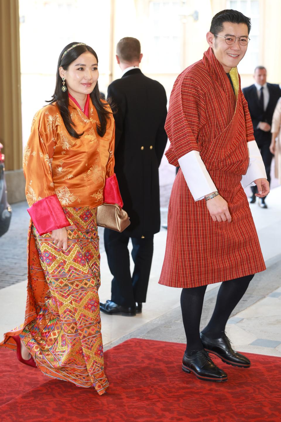 The king and queen of Bhutan attend a coronation reception at Buckingham Palace