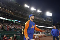 New York Mets starting pitcher Max Scherzer is introduced onto the field prior to an opening day baseball game against the Washington Nationals at Nationals Park, Thursday, April 7, 2022, in Washington. (AP Photo/Alex Brandon)