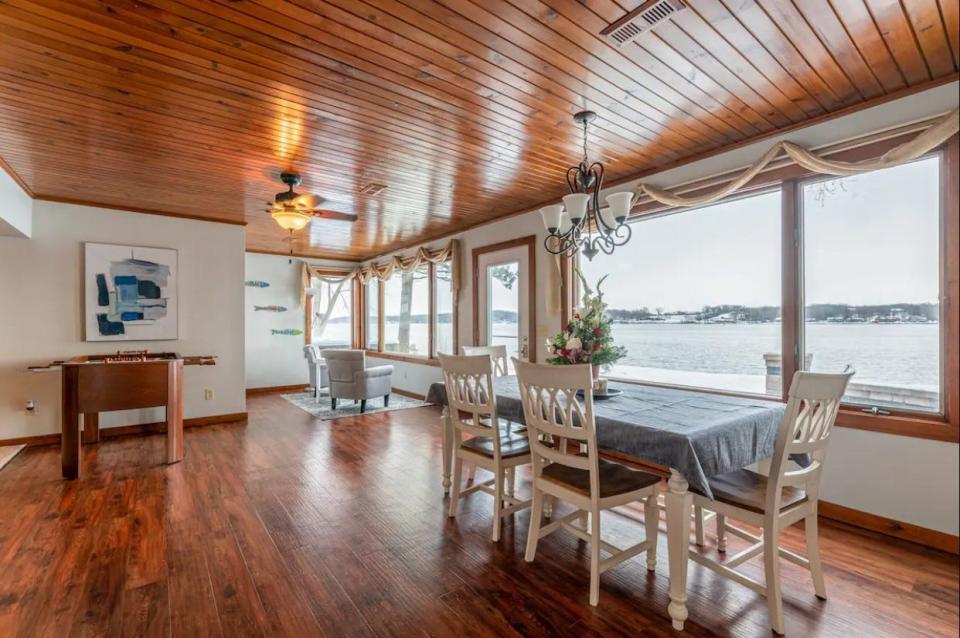 This home in LeClaire offers a view of the Mississippi River and a hot tub for relaxing.