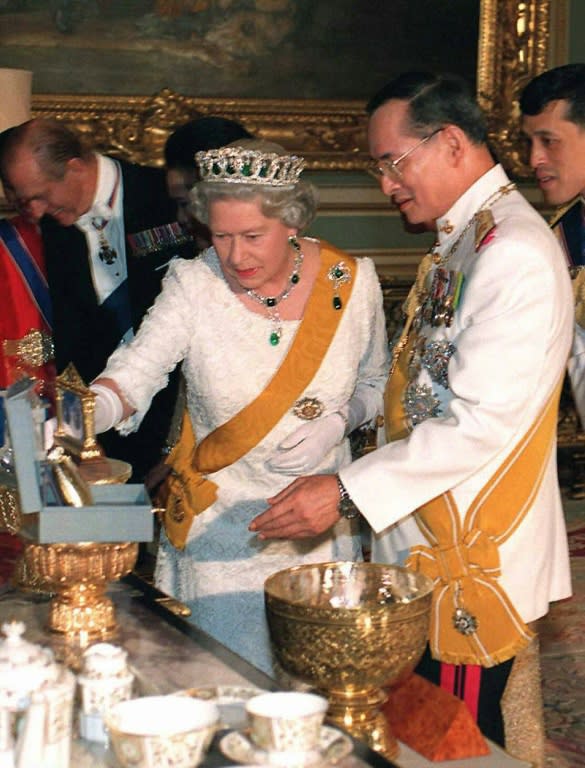 Britain's Queen Elizabeth II with Thai King Bhumibol Adulyadej in Bangkok in 1996