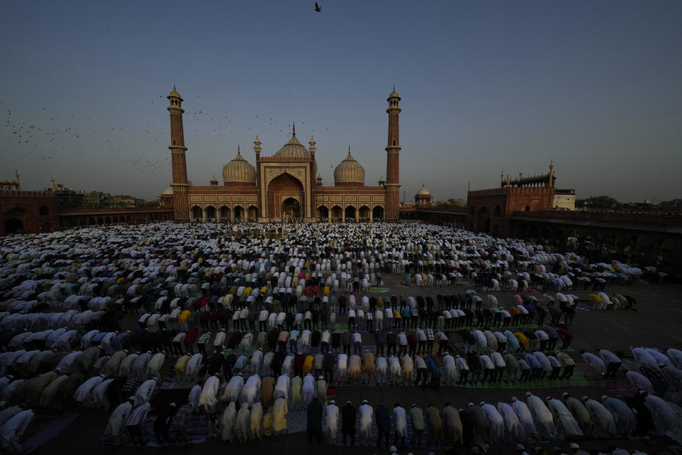 Devout Muslims offer Eid al-Adha prayers at the Jama Masjid, in New Delhi, India, Monday, June 17, 2024. Muslims around the world celebrate Eid al-Adha by sacrificing animals to commemorate the prophet Ibrahim's faith in being willing to sacrifice his son. (AP Photo/Manish Swarup)