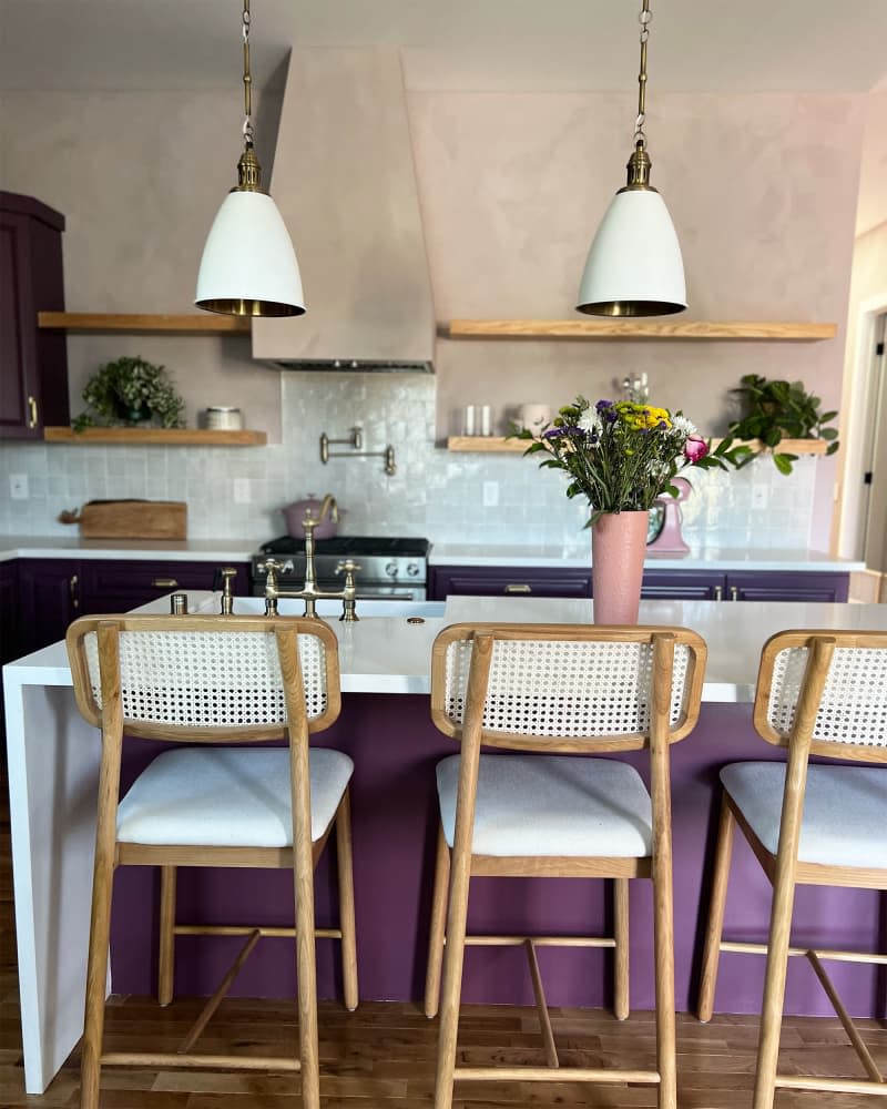 Eggplant painted cabinets in kitchen.