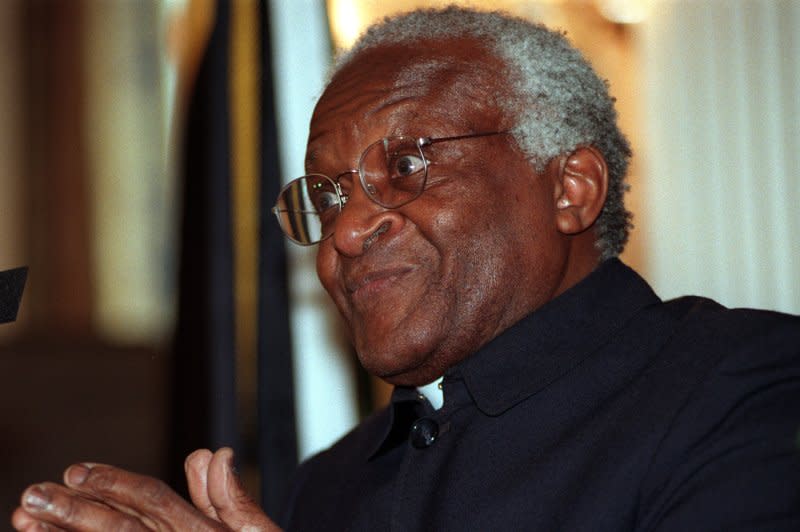 South African Archbishop Desmond Tutu speaks at a luncheon gathering, March 25, 1999, at a U.S. Capitol office building in Washington. On September 7, 1986, Tutu was installed as the Anglican archbishop of Cape Town, becoming first black titular head of South Africa's fourth-largest Christian church. File Photo by Ian Wagreich/UPI