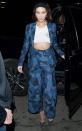 <p>In a patchwork suit from Dior's fall 2018 collection, cropped white tee, and denim pumps while out in LA.</p>