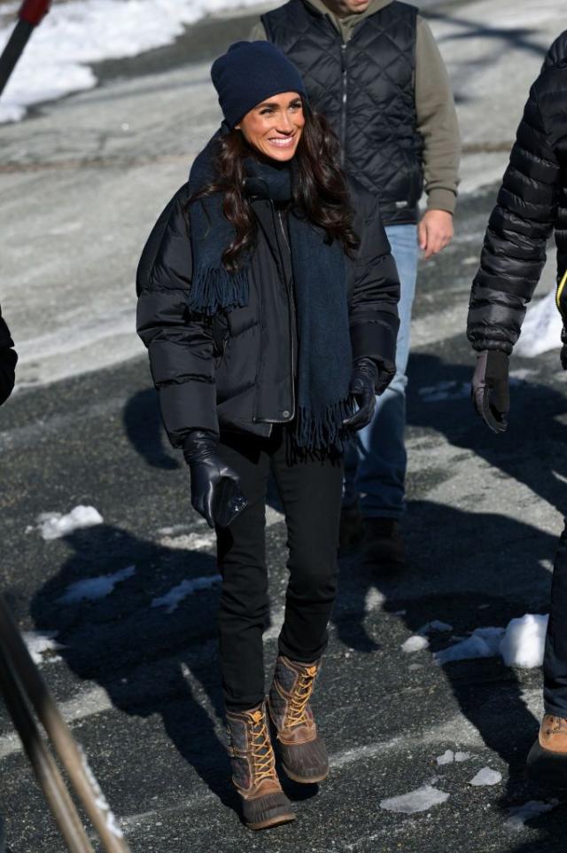 Meghan Markle in black leggings and brown boots in Vancouver on