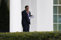 Michael Lindell, CEO of My Pillow, Inc., waits to go into the West Wing of the White House, Friday, Jan. 15, 2021, in Washington. (AP Photo/Gerald Herbert)