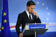 Dutch Prime Minister Mark Rutte speaks during a media conference at the end of an EU summit in Brussels, Friday, Feb. 21, 2020. Major contributors to the European Union's budget blocked progress at an emergency summit on Friday, insisting that they would not stump up more funds for the bloc's next long-term spending package. (AP Photo/Olivier Matthys)