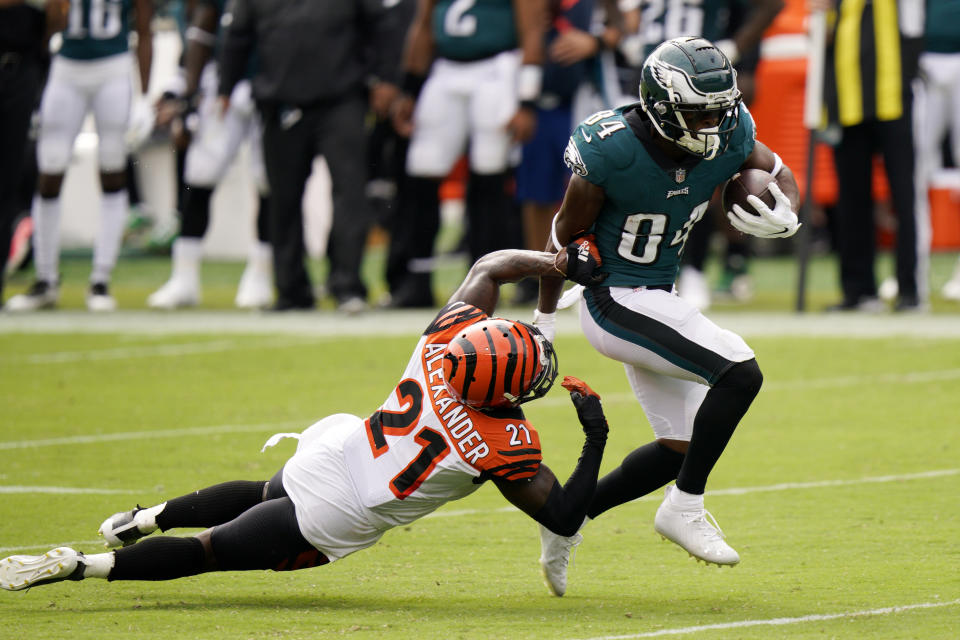 Philadelphia Eagles' Greg Ward (84) tries to get past Cincinnati Bengals' Mackensie Alexander (21) during the first half of an NFL football game, Sunday, Sept. 27, 2020, in Philadelphia. (AP Photo/Chris Szagola)