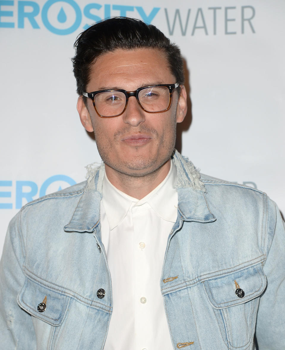 Close-up of Chad Veach in a denim jacket and shirt