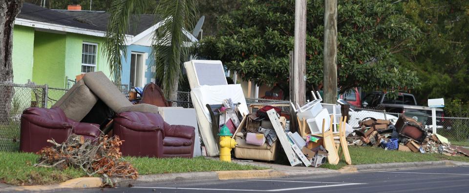 Some Midtown residents lost nearly everything they own to the floodwaters of Tropical Storm Ian, which roared through Daytona Beach Sept. 27 and 28. Pictured are flood-damaged belongings on South Caroline Street left for trash collectors to pick up.
