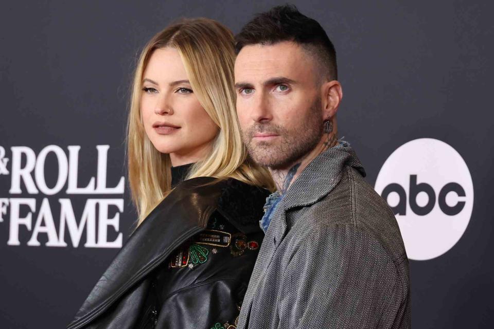 <p>Mike Coppola/WireImage</p> Behati Prinsloo and Adam Levine attend the 38th Annual Rock & Roll Hall Of Fame Induction Ceremony at Barclays Center on November 03, 2023 in New York City.