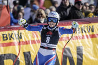 France's Romane Miradoli reacts as she crosses the finish line of an alpine ski, women's World Cup super-G, in Lenzerheide, Switzerland, Saturday, March 5, 2022. (AP Photo/Giovanni Auletta)