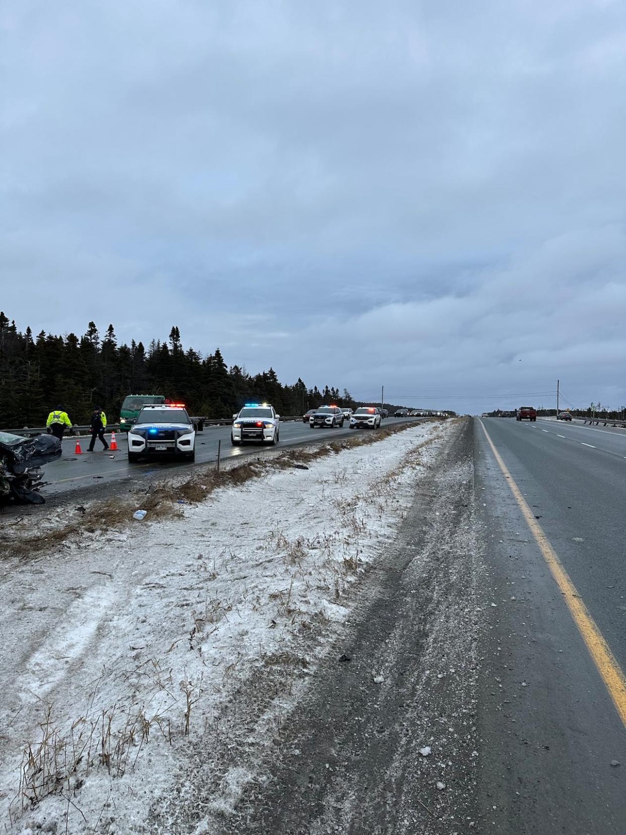 A multi-vehicle crash shut down all four lanes of the divided highway near the Team Gushue exit on the Outer Ring Road on Thursday morning. (Royal Newfoundland Constabulary/X - image credit)