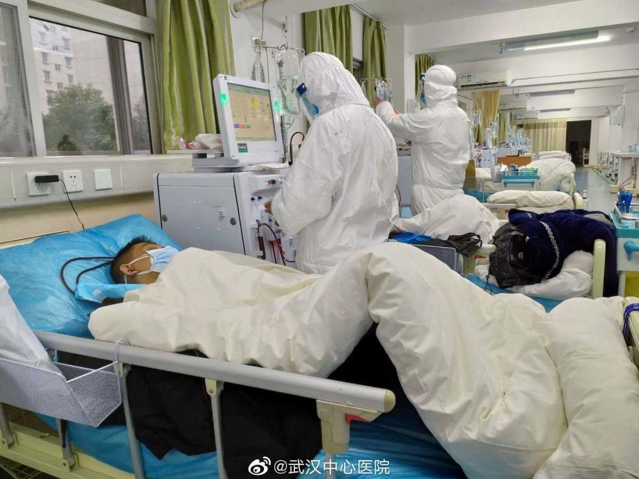 Picture uploaded to social media on January 25, 2020 by the Central Hospital of Wuhan shows medical staff attending to patients: Reuters