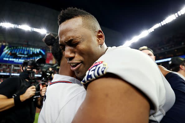 HOUSTON, TEXAS - NOVEMBER 02:  Jorge Soler #12 and Ozzie Albies #1 of the Atlanta Braves celebrate their 7-0 victory against the Houston Astros in Game Six to win the 2021 World Series at Minute Maid Park on November 02, 2021 in Houston, Texas. (Photo by Carmen Mandato/Getty Images)