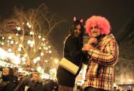 Revellers take part in New Year celebrations in Budapest January 1, 2014. REUTERS/Bernadett Szabo