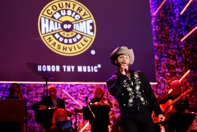 <p>Jason Kempin/Getty</p> Charley Crockett performs onstage during the Class of 2023 Medallion Ceremony at Country Music Hall of Fame and Museum on Oct. 22, 2023 in Nashville