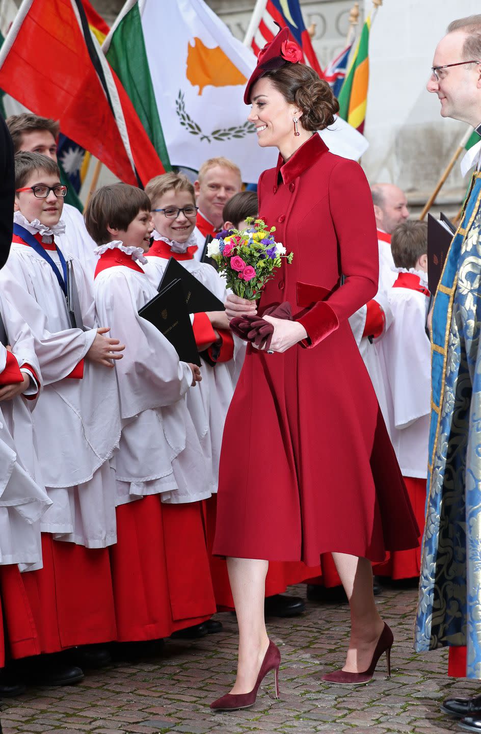 <p>The Duchess of Cambridge prepares to leave Westminster Abbey. </p>