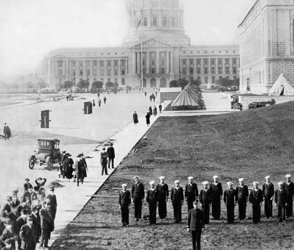 An emergency flu hospital staffed by US Navy Hospital corpsman has been set up in Civic Center to help care for those stricken by the influenza outbreak, San Francisco, California, 1918. (Photo by Underwood Archives/Getty Images)