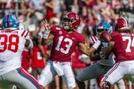 Alabama quarterback Tua Tagovailoa (13) throws long during the first half of an NCAA college football game against Mississippi, Saturday, Sept. 28, 2019, in Tuscaloosa, Ala. (AP Photo/Vasha Hunt)