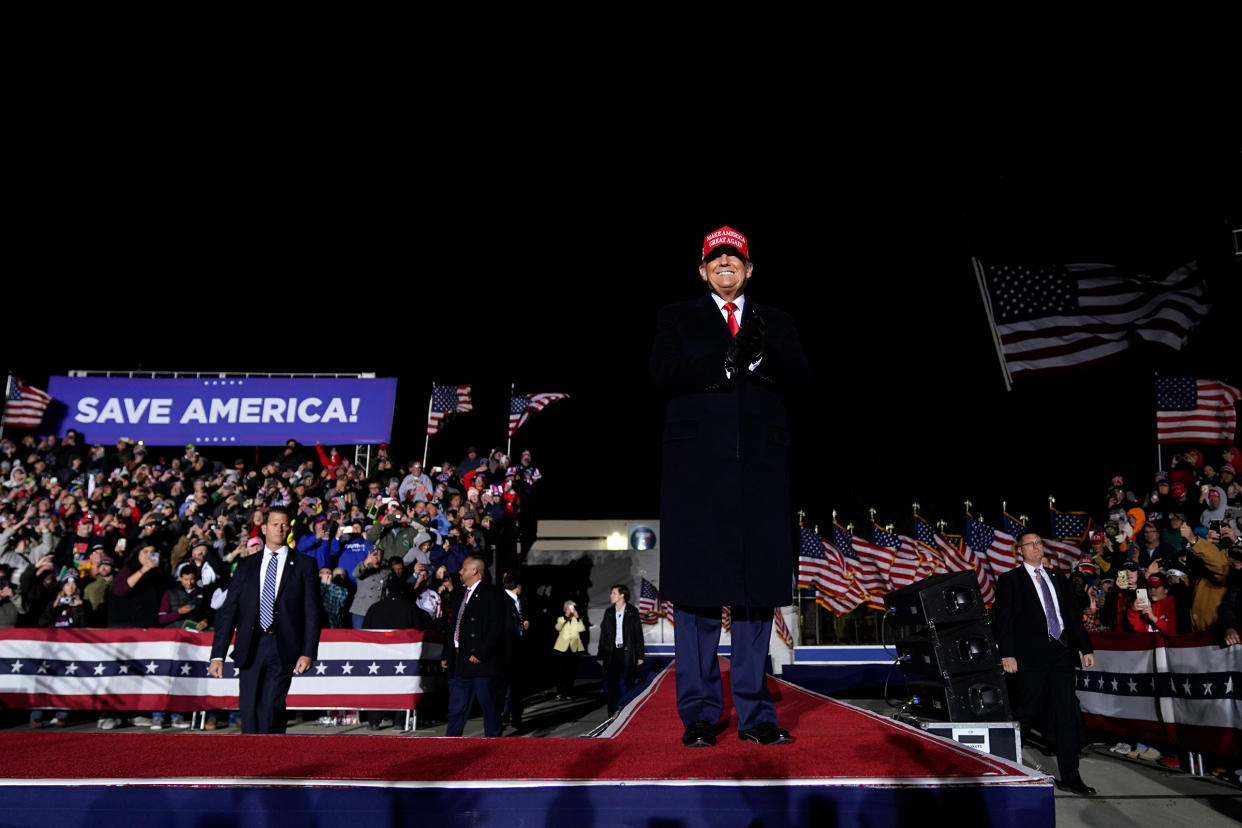 Former President Donald Trump arrives to speak at a rally in Sioux City, Iowa, Nov. 3, 2022.