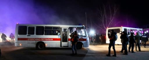 Police in Ukraine had to protect buses carrying evacuees from coronavirus-hit China from protesters as they drove to a medical facility in Novi Sanzhary