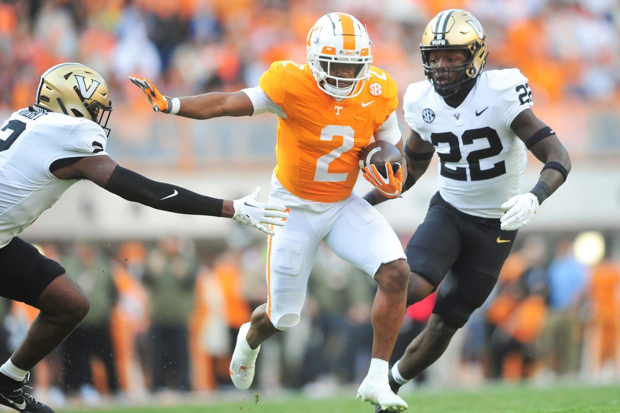 Running back Jabari Small (2) kicks it into gear against Vanderbilt Nov. 25, 2023.