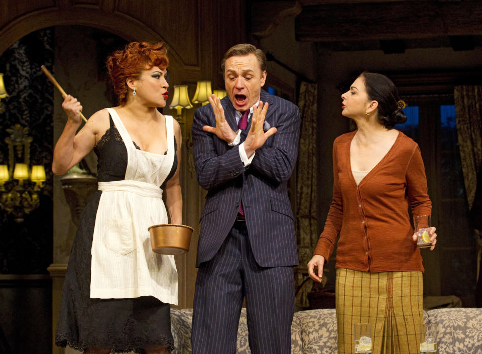 In this theater image released by Boneau/Bryan-Brown, Jennifer Tilly, left, Ben Daniels, center, and Spencer Kayden are shown in a scene from the Roundabout Theatre Company's "Don't Dress for Dinner," in New York. (AP Photo/Boneau/Bryan-Brown, Joan Marcus)