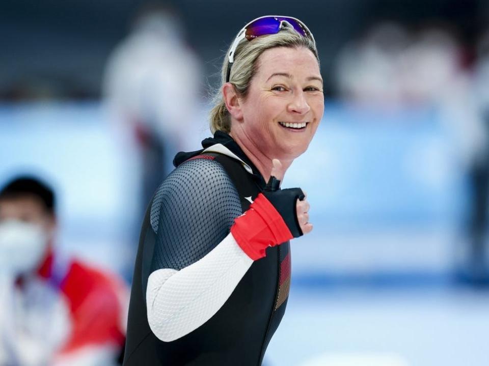 Speed skater Claudia Pechstein of Germany smiles and gives a thumbs-up