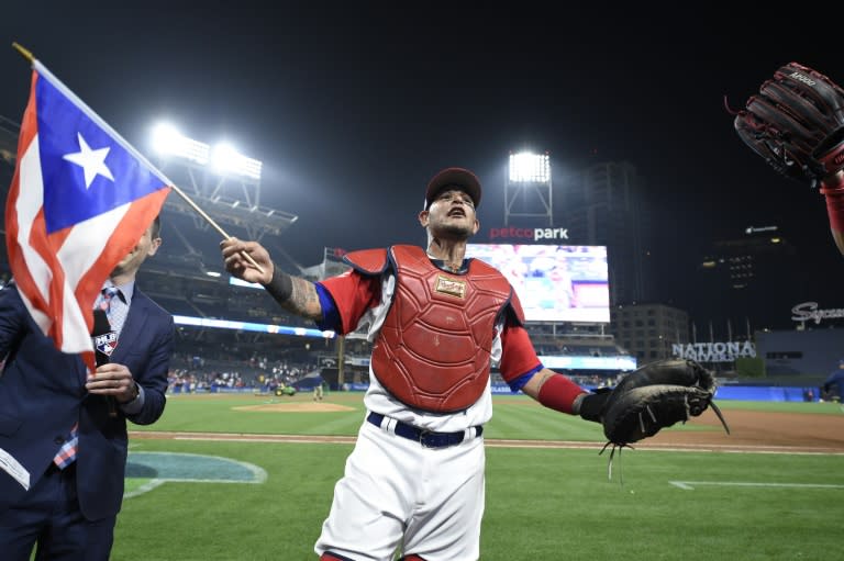 Yadier Molina of Puerto Rico celebrates after beating the Dominican Republic 3-1 in their World Baseball Classic Pool F game, at PETCO Park in San Diego, California, on March 14, 2017