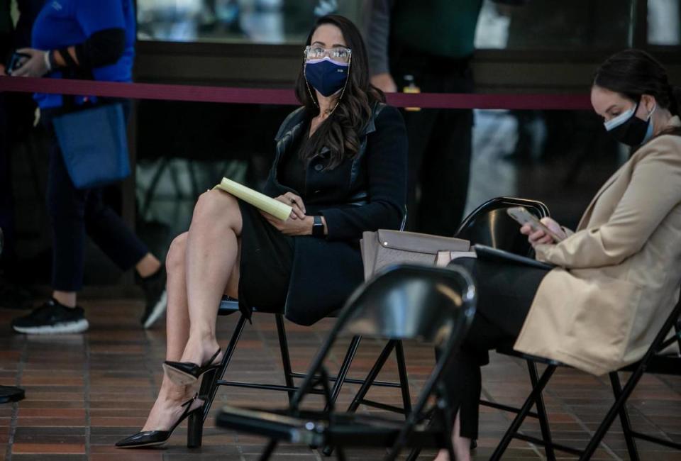 Danielle Cohen Higgins sits in the public participation area on the ground floor of the Stephen P. Clark Government Center during a commission meeting on Monday, December 1, 2020.