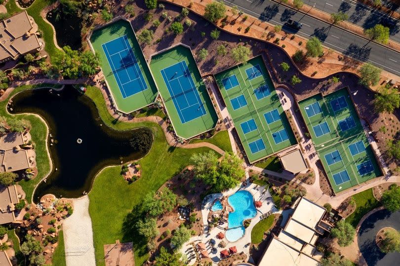 A bird's eye view of the resort - with an epic golf course, tennis courts, large pool, and spa