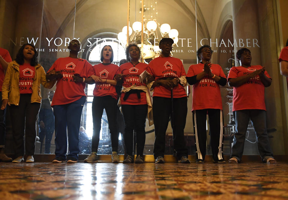 Tenants and members of the Upstate Downstate Housing Alliance from across the state, demand New York Gov. Andrew Cuomo and state legislators pass universal rent control legislation that would strengthen and expand tenants rights across the state of New York before rent laws expire on June 15th during a protest rally at the state Capitol Tuesday, June 4, 2019, in Albany, N.Y. (AP Photo/Hans Pennink)