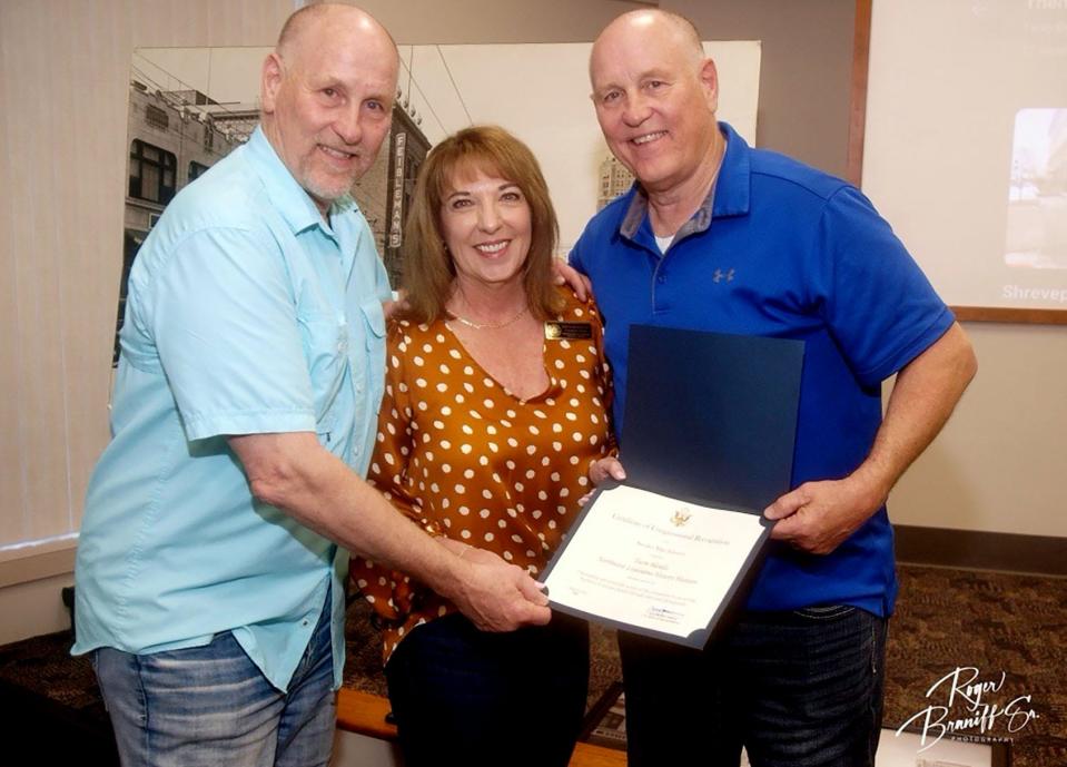 Kristi Brian DeYoung with Mark (right) and Mike Mangham of Twin Blends and the Certificate of Appreciation from Speaker Mike Johnson.